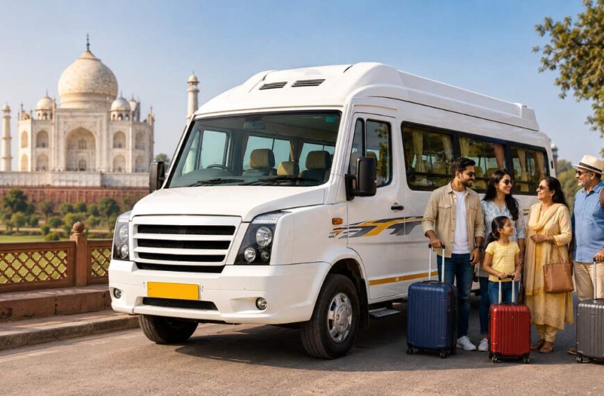 White Tempo Traveller with a family and luggage near the Taj Mahal, representing group travel and Tempo Traveller rental services in India.
